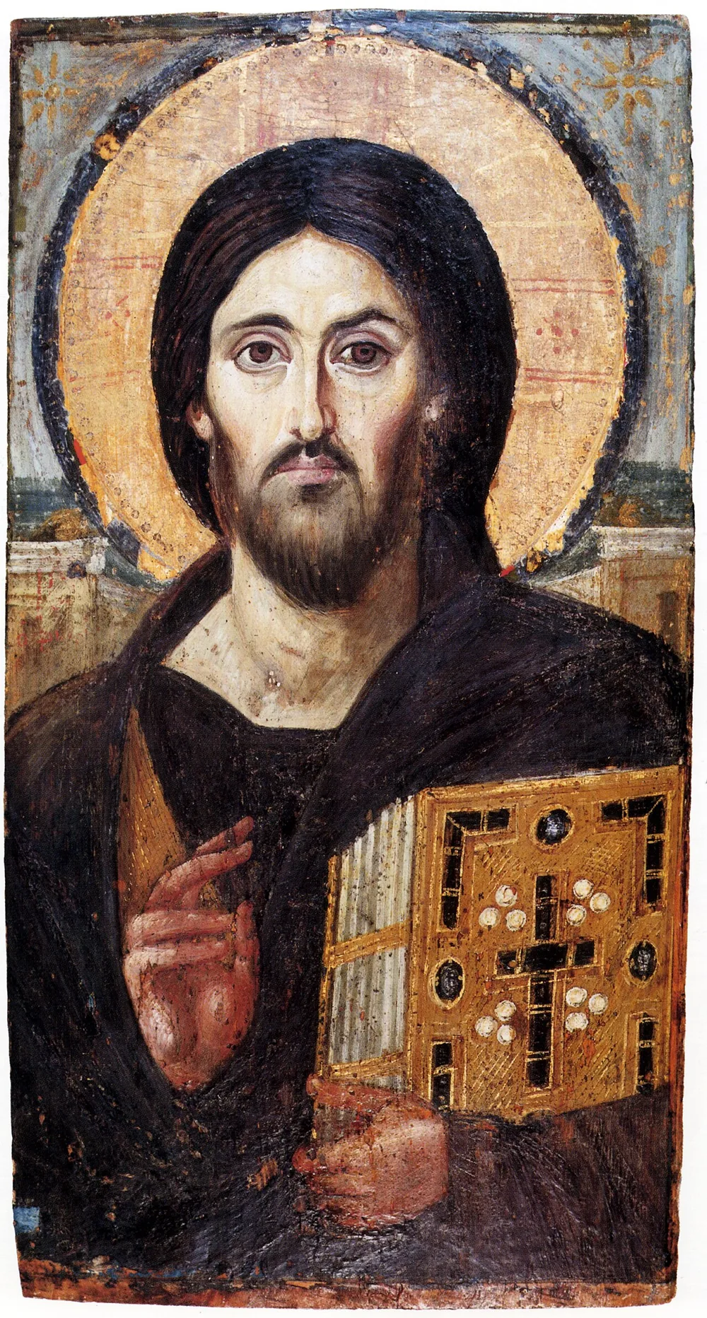 The 6th-century icon of Christ Pantocrator — Christ the Merciful — blessing with his right hand and holding the Gospel